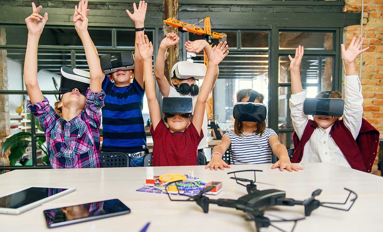 Kids wearing VR headsets